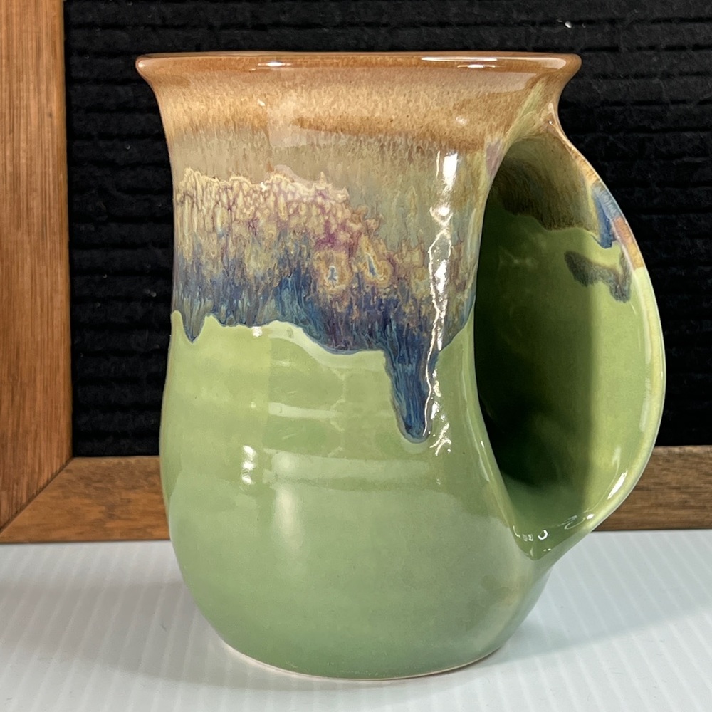 Clay in Motion Pottery Hand Warmer Mug Signed Neher Drip Glazed Green Blue Brown